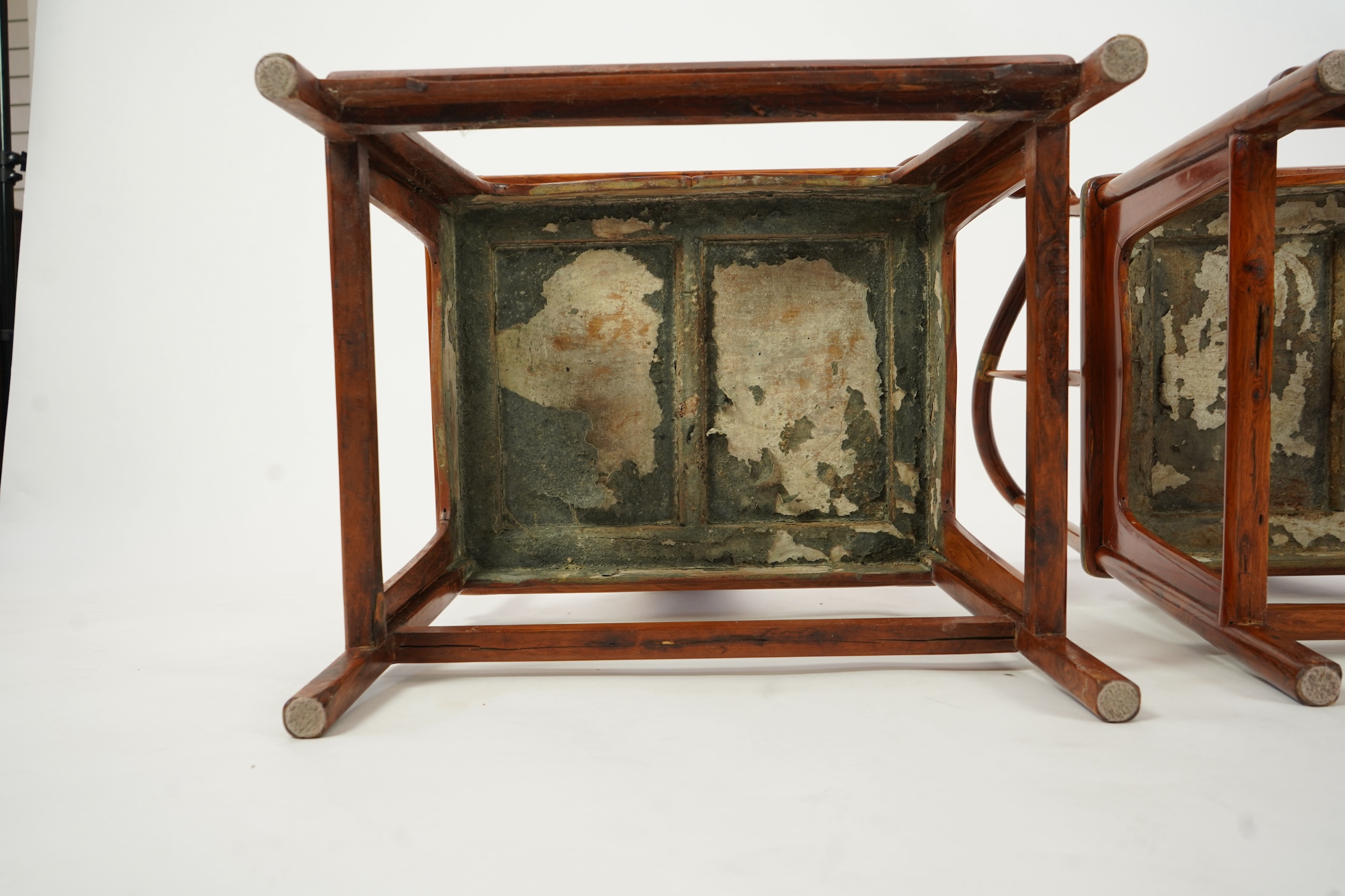 A pair of Chinese huanghuali and brass mounted horseshoe-back armchairs, quanyi, 19th century
